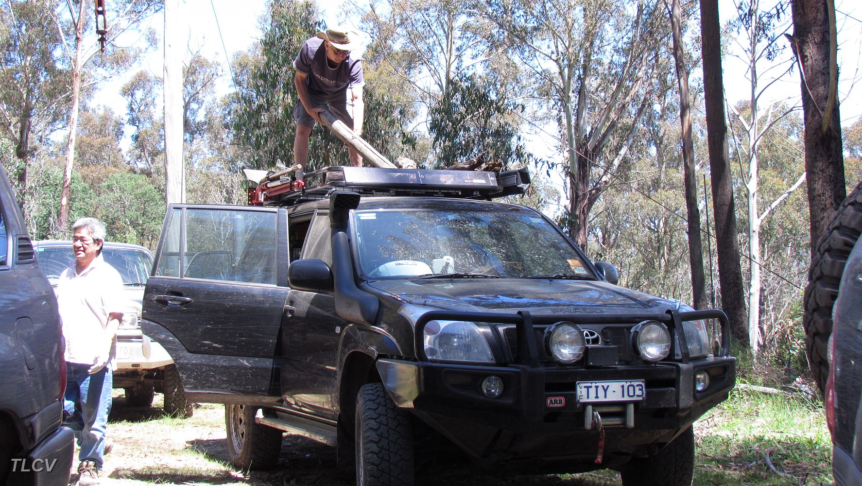 18-Reg finds some logs for tonight's camp fire.JPG